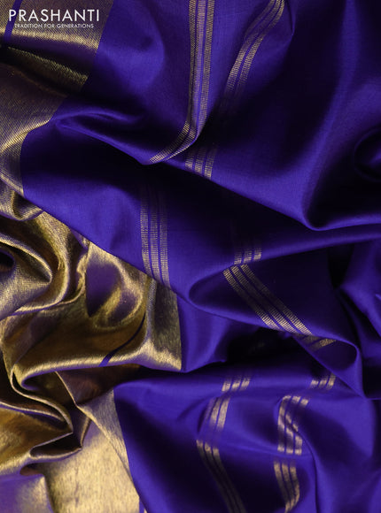 Pure kanchipuram silk saree blue and gold with plain body and temple rich zari woven border