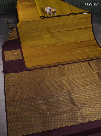Pure kanchipuram silk saree mustard green and coffee brown with allover zari stripe pattern and zari woven butta border