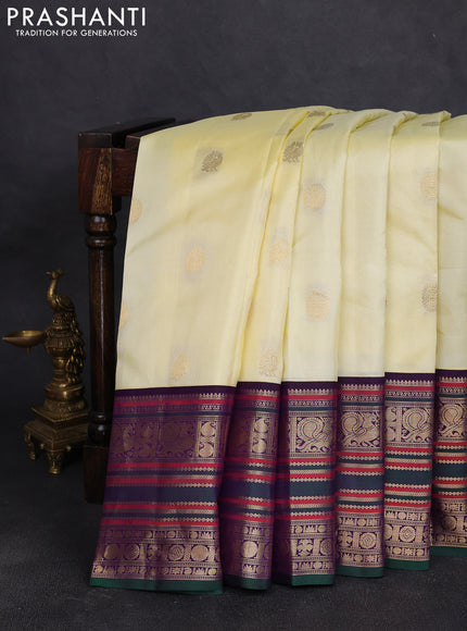Pure kanchipuram silk saree cream and bottle green with zari woven buttas and long zari woven korvai border