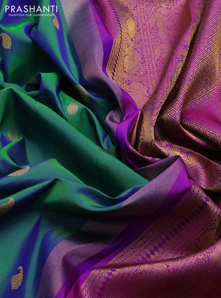 Pure kanchipuram silk saree dual shade of bluish green and pink with paisley zari woven buttas and long zari woven korvai border
