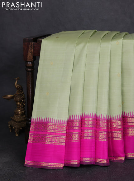 Pure kanchipuram silk saree pista green and pink with zari woven buttas and temple design rettapet zari woven border