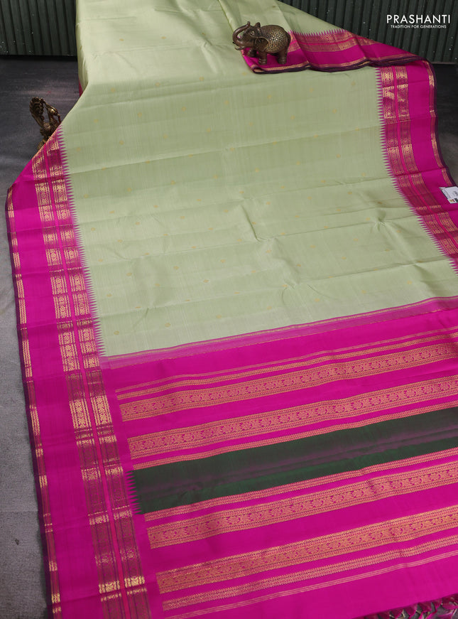 Pure kanchipuram silk saree pista green and pink with zari woven buttas and temple design rettapet zari woven border