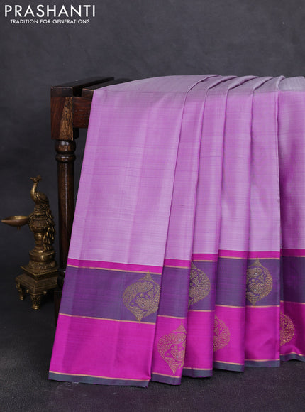 Pure kanchipuram silk saree pastel purple and dual shade of green with plain body and zari woven butta border