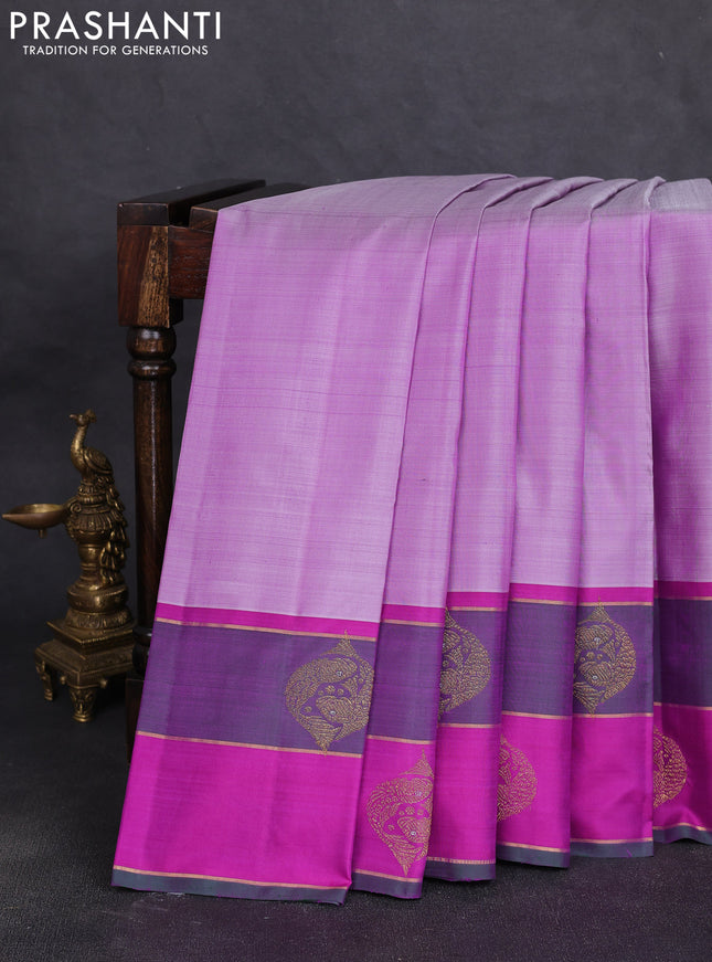Pure kanchipuram silk saree pastel purple and dual shade of green with plain body and zari woven butta border