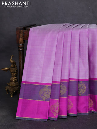 Pure kanchipuram silk saree pastel purple and dual shade of green with plain body and zari woven butta border