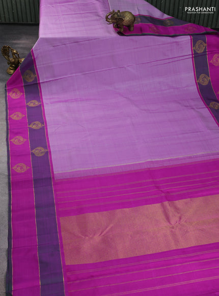 Pure kanchipuram silk saree pastel purple and dual shade of green with plain body and zari woven butta border
