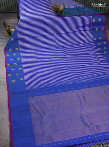 Pure kanchipuram silk saree violet and dual shade of bluish green with allover weaves and zari woven butta border