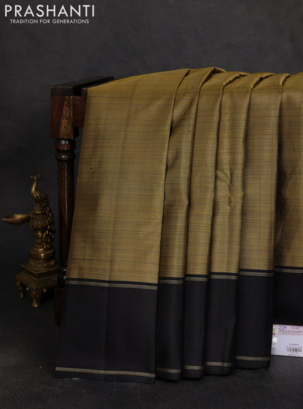 Pure kanchipuram silk saree gold and black with allover vairaosi pattern and rettapet zari woven border