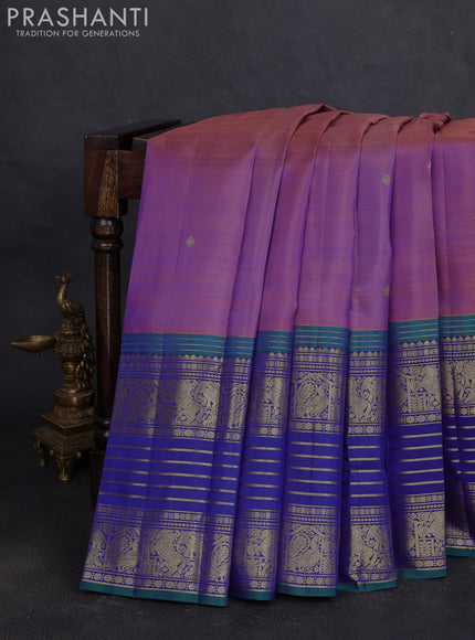 Pure kanchipuram silk saree dual shade of purple and peacock blue with allover zari woven buttas and long zari woven border