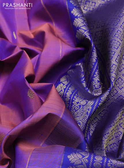 Pure kanchipuram silk saree dual shade of purple and peacock blue with allover zari woven buttas and long zari woven border