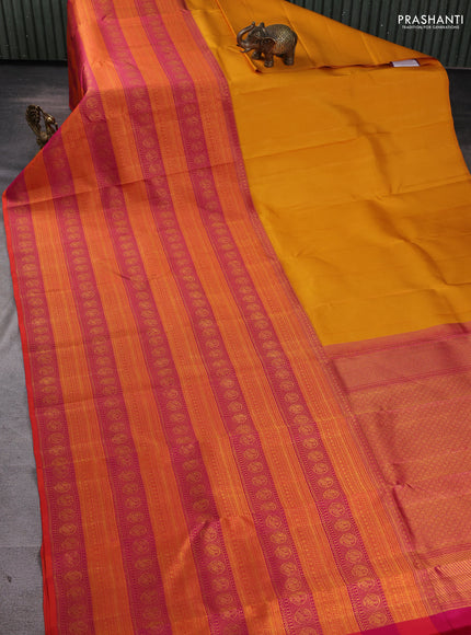 Pure kanchipuram silk saree mustard yellow and pink with half & half style and long zari woven border