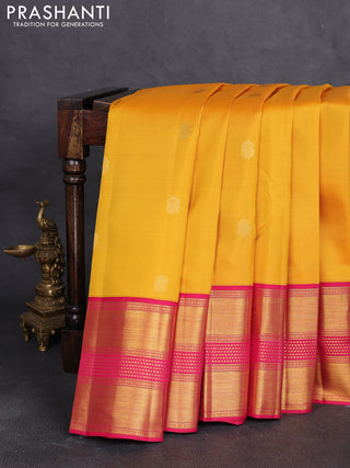 Pure kanchipuram silk saree yellow and dark pink with allover zari woven buttas and long rich zari woven border