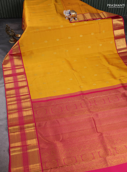 Pure kanchipuram silk saree yellow and dark pink with allover zari woven buttas and long rich zari woven border