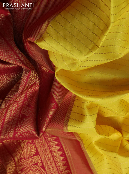 Pure kanchipuram silk saree yellow and maroon with allover zari weaves and zari woven border