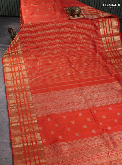Pure kanchipuram silk saree orange with allover zari checks & buttas and long zari woven border