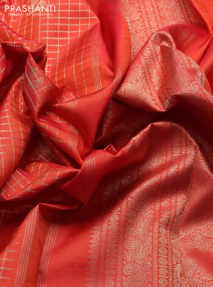 Pure kanchipuram silk saree orange with allover zari checks & buttas and long zari woven border