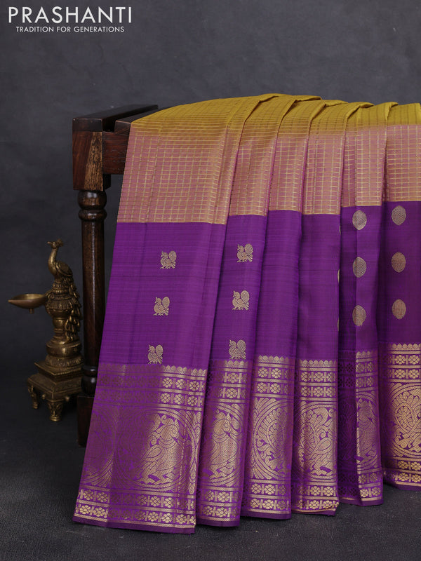 Pure kanchipuram silk saree dual shade of dark mustard and deep purple with allover zari checked pattern and long zari woven butta border