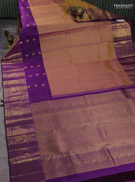 Pure kanchipuram silk saree dual shade of dark mustard and deep purple with allover zari checked pattern and long zari woven butta border