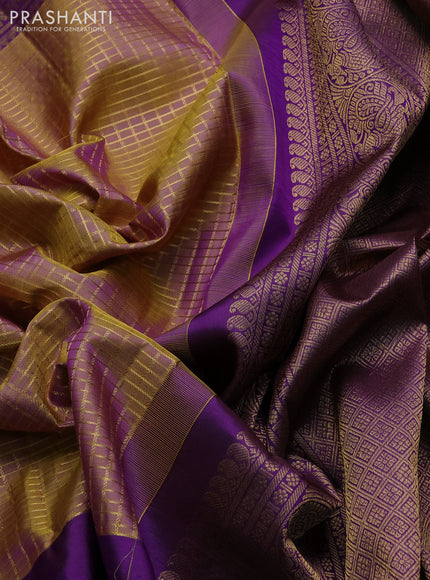 Pure kanchipuram silk saree dual shade of dark mustard and deep purple with allover zari checked pattern and long zari woven butta border