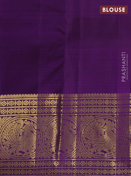 Pure kanchipuram silk saree dual shade of dark mustard and deep purple with allover zari checked pattern and long zari woven butta border