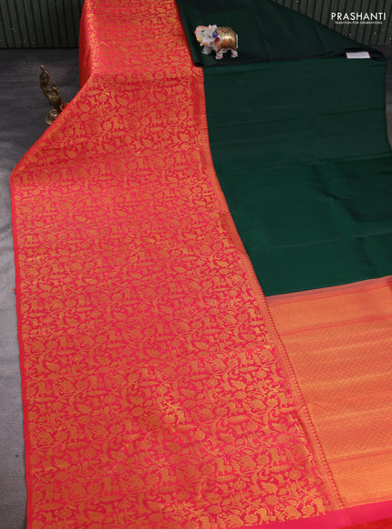 Pure kanchipuram silk saree bottle green and orange with half & half style and long zari woven border