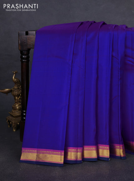 Pure kanchipuram silk saree violet and dual shade of red with plain body and zari woven border