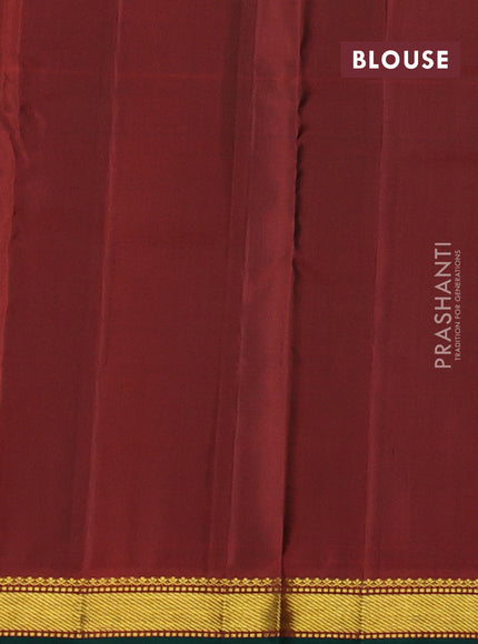Pure kanchipuram silk saree bottle green and orange with plain body and zari woven border