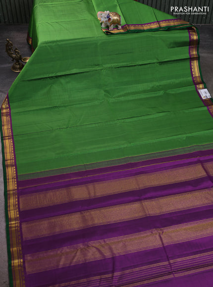 Pure kanchipuram silk saree light green and purple with plain body and temple zari woven border