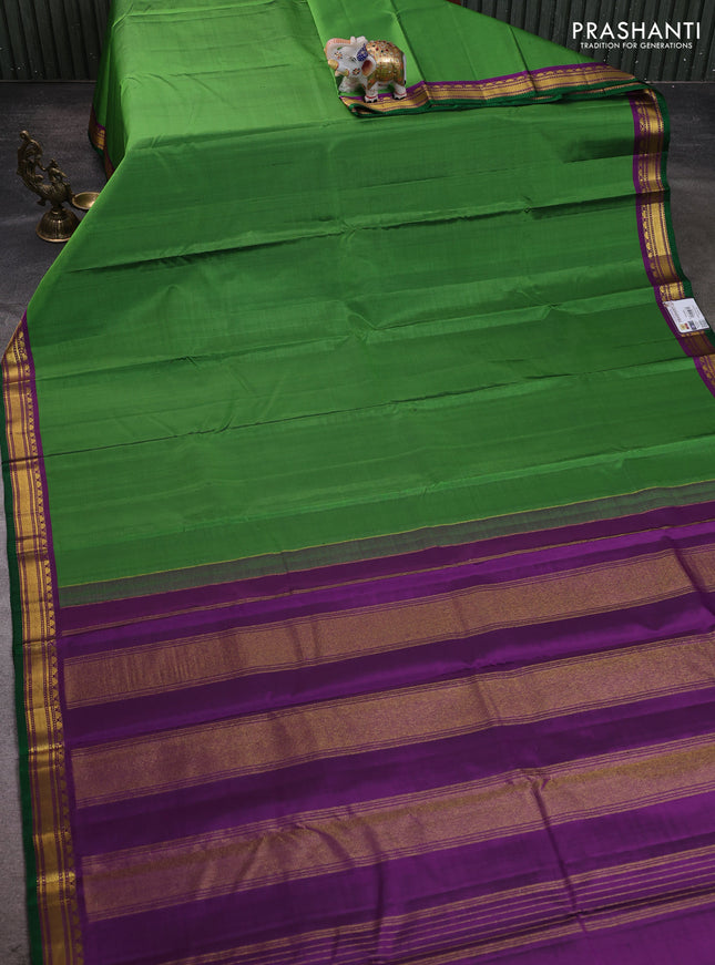 Pure kanchipuram silk saree light green and purple with plain body and temple zari woven border