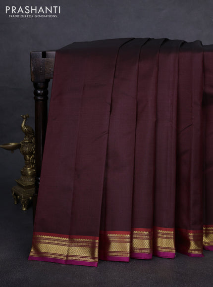 Pure kanchipuram silk saree deep maroon and red with plain body and zari woven border