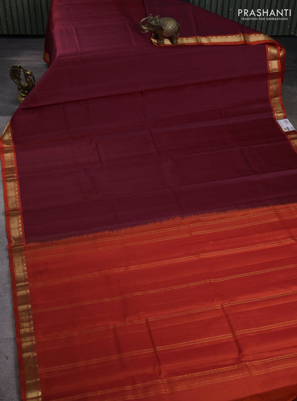 Pure kanchipuram silk saree maroon and orange with plain body and temple design zari woven border