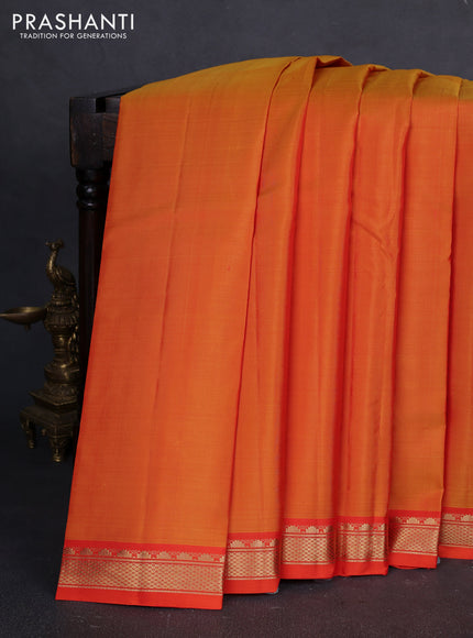 Pure kanchipuram silk saree sunset orange and orange with plain body and temple design zari woven border