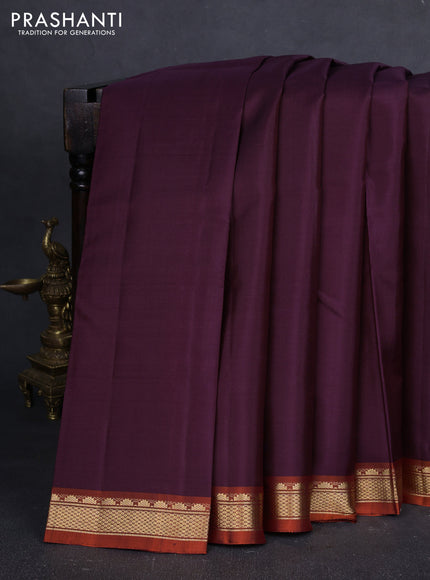 Pure kanchipuram silk saree deep wine and orange with plain body and temple design zari woven border