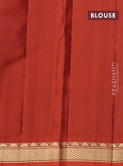 Pure kanchipuram silk saree deep wine and orange with plain body and temple design zari woven border