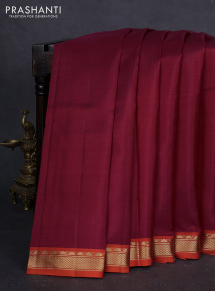 Pure kanchipuram silk saree maroon and orange with plain body and temple design zari woven border