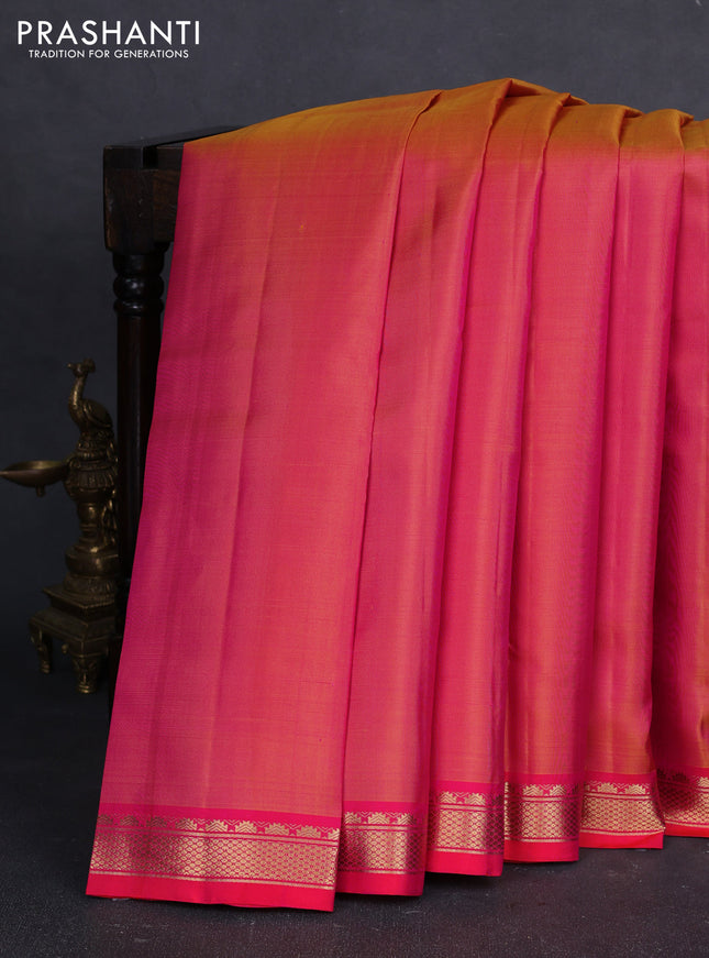 Pure kanchipuram silk saree orange and pink with plain body and temple design zari woven border