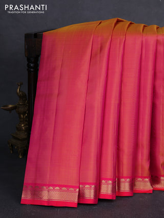 Pure kanchipuram silk saree orange and pink with plain body and temple design zari woven border