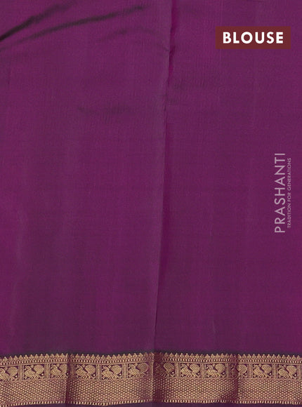 Pure kanchipuram silk saree dual shade of pinkish yellow and green with allover zari woven buttas and zari woven border