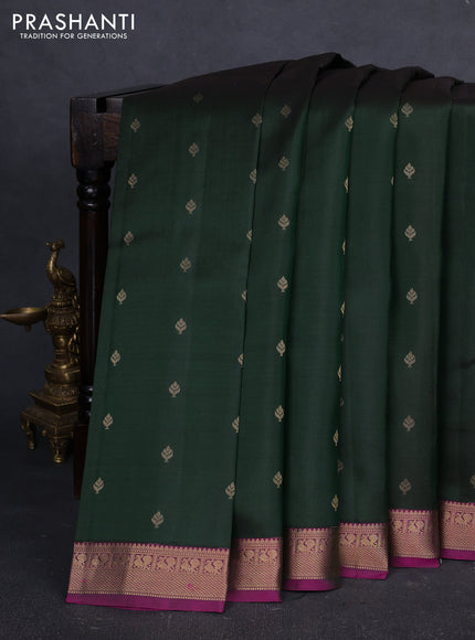 Pure kanchipuram silk saree bottle green and purple with allover zari woven buttas and zari woven border