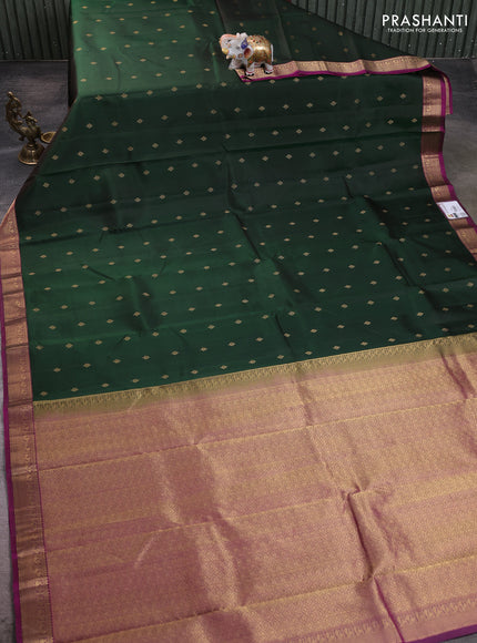 Pure kanchipuram silk saree bottle green and purple with allover zari woven buttas and zari woven border