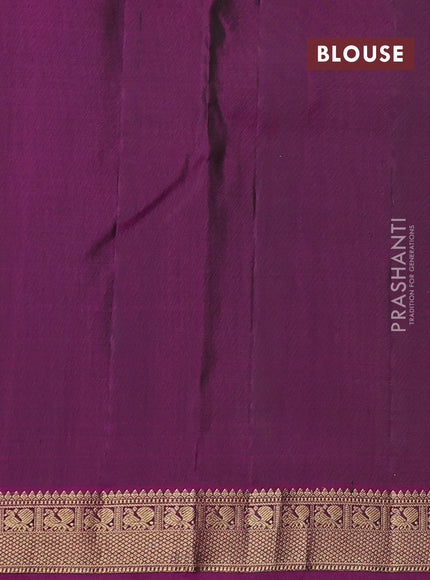 Pure kanchipuram silk saree bottle green and purple with allover zari woven buttas and zari woven border
