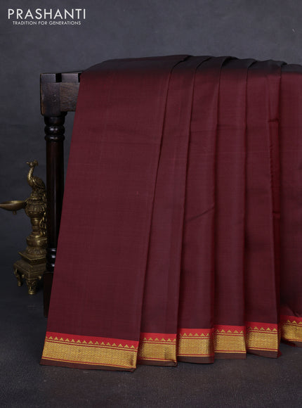Pure kanchipuram silk saree deep maroon and red with plain body and zari woven border