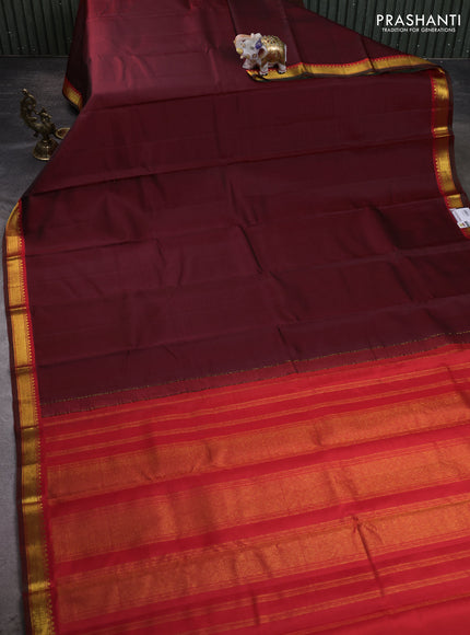 Pure kanchipuram silk saree deep maroon and red with plain body and zari woven border