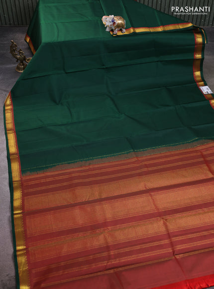 Pure kanchipuram silk saree bottle green and red with plain body and zari woven border