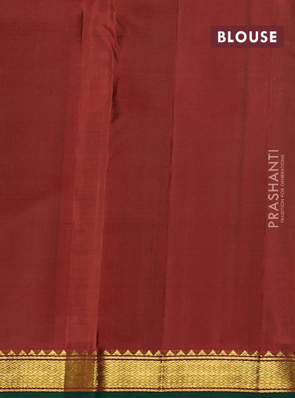 Pure kanchipuram silk saree bottle green and red with plain body and zari woven border