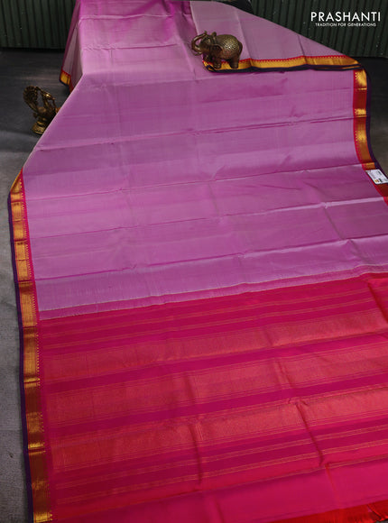 Pure kanchipuram silk saree pastel purple and purple with plain body and zari woven border