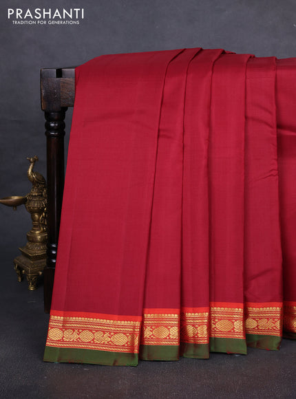 Pure kanchipuram silk saree maroon and red with plain body and zari woven border