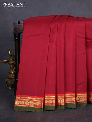 Pure kanchipuram silk saree maroon and red with plain body and zari woven border