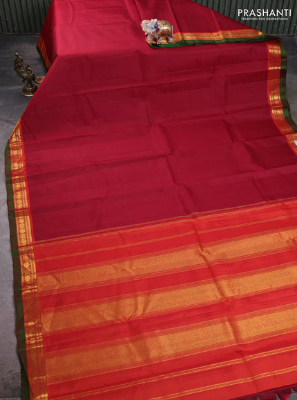 Pure kanchipuram silk saree maroon and red with plain body and zari woven border