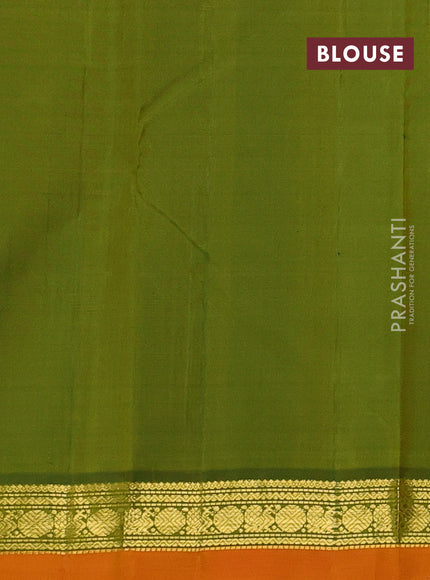 Pure kanchipuram silk saree yellow and orange with plain body and zari woven border
